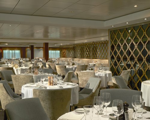 NCL Norwegian Gem Magenta Main Dining Room.jpeg