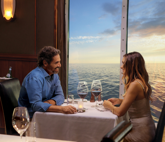 A couple dining with ocean views