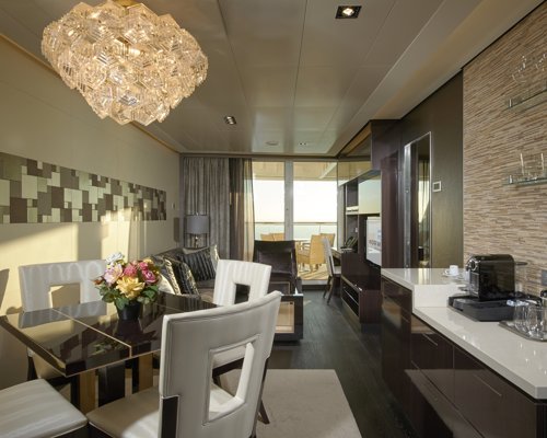 NCL Norwegian Escape The Haven Deluxe Owner's Suite with Balcony 1.jpeg