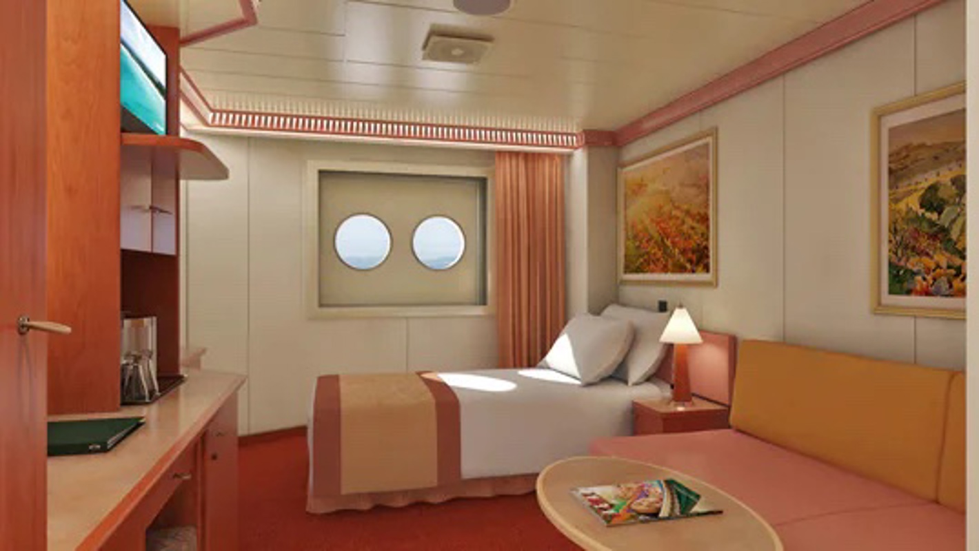 Carnival Cruise Line Carnival Freedom Interior UpperLower Porthole.jpg