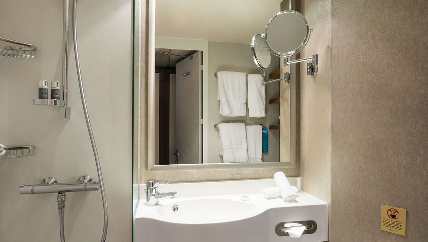 azamara club cruises azamara onward club balcony plus stateroom 2.jpeg