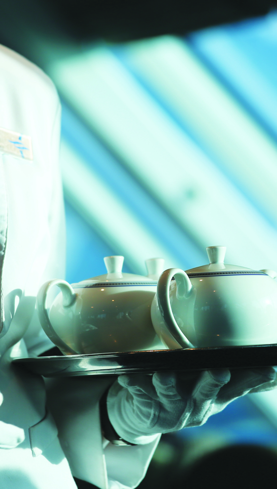 Traditional afternoon tea service on Oceania Cruises in the Horizons observation lounge