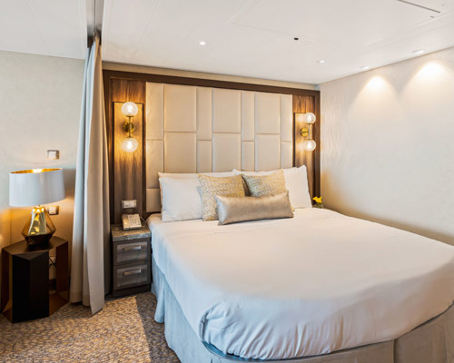 RCI Wonder of the Seas Grand Suite 1 Bedroom 2.jpeg