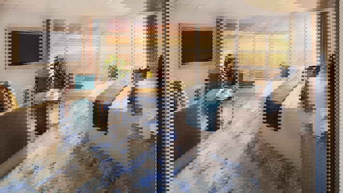 RCI Icon of the Seas Sunset Junior Suite.jpeg