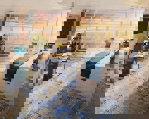 RCI Icon of the Seas Sunset Junior Suite.jpeg